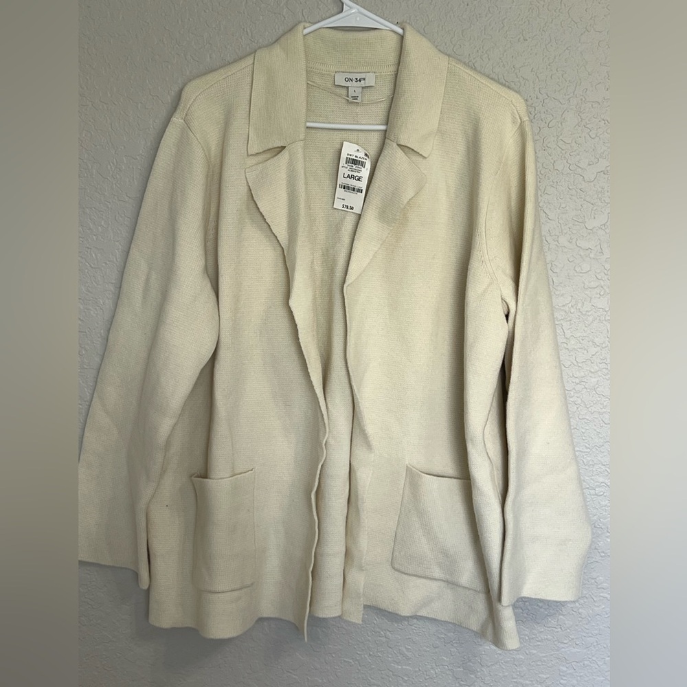 On Running Women's Cream Blazer
Caja 7
